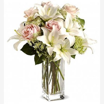 Vase with 5 Stems of White Lilies , 6 Stems of Off White Roses with Lady Lase or Gypsophelia